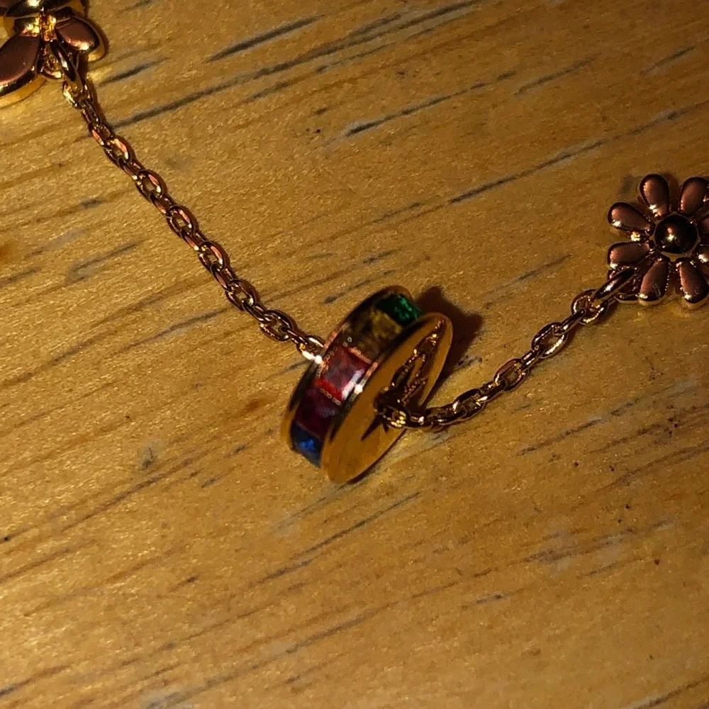 Kate Spade Gold Tone Rainbow Joy Charm Bracelet Heart, Flower, Clover NWT - Picture 4 of 12